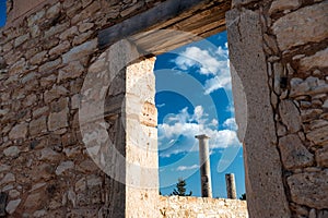 Columns seen through doorway in Apollo Hylates sanctuary, Cyprus