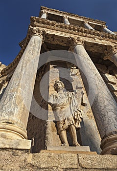Columns and Statue at the Proscenium of the Roman Theater of Merida, Spain