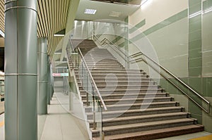 Columns and a stairway at a subway station underpass photo