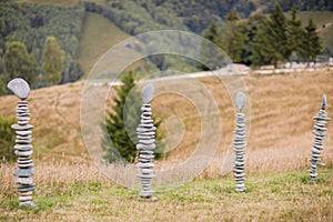 Columns of stones carefully balanced one on top of the other, displaying a sense of calm and concentration