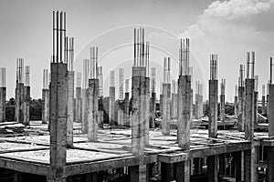 Columns under construction in Yangon outskirts, black and white image