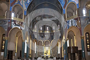 Columns and the walls with beautiful paintings inside of the  Basilica of Santa Rita da Cascia