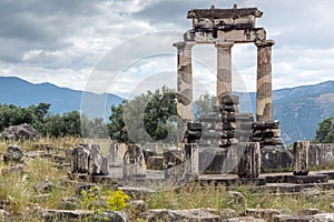 Colums in Athena Pronaia Sanctuary at Ancient Greek archaeological site of Delphi, Greece