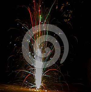 Colurful tubri anar firework during diwali festival durga kali puja dusshera india