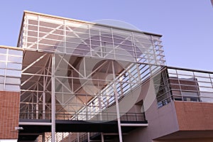 The Colvard building at UNC Charlotte with an American and North Carolina Flag photo