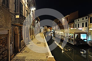 Comacchio, Ferrara, Italy. Night view of a Canal
