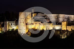 Comares Tower of the Alhambra in Granda, Spain at night photo