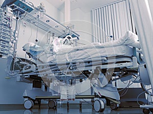 Comatose patient in ICU photo
