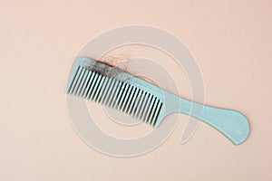 Comb with hair loss, health problem, issue of aging, alopecia areata by stress or infection, hairbrush