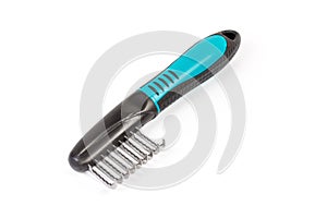 Comb for remove tangles of pets fur on white background