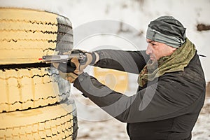 Combat gun shooting training behind and around cover or barricade