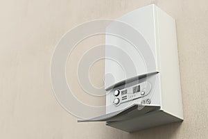 Combi boiler on the wall. Copy space on the left. 3D illustration