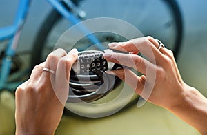 Combination bike lock in female hands