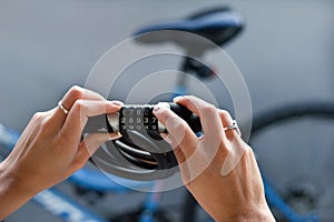 Combination bike lock in female hands