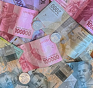 A combination of coins and paper Indonesian Rupiah 0r (Rupee) money.