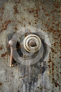 Combination dial on rusted old safe