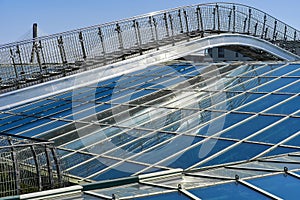 A combination of glass and metal. Modern technologies for the construction of office buildings. Exterior design element