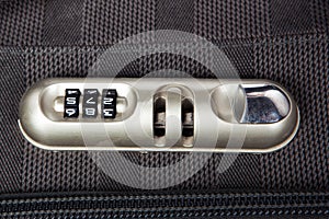 Combination lock on suitcase