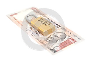 Combination padlock on Indian currency rupee