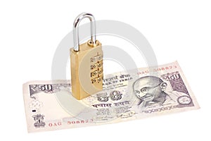 Combination padlock on Indian currency rupee