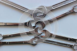 Combination Wrenches of different sizes inserted into each other with open ends