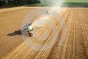 Combine harvester in action on wheat field