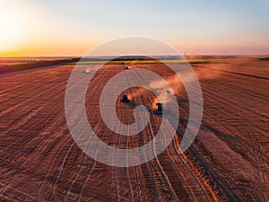 Combine harvester agriculture machine harvesting golden ripe wheat field