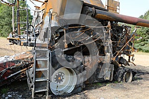 Combine harvester destroyed by fire