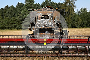 Combine harvester destroyed by fire