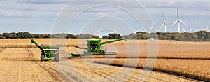 A combine harvester harvesting soybeans