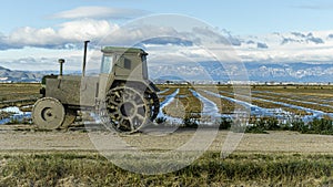 Combine harvester in a rice field in the Ebro Delta photo