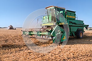 Combine harvester at the wheat field