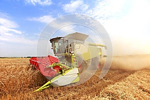 Combine harvester in a wheat field