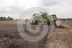 Combine harvesting crops