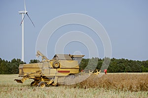 Combine harvesting the field