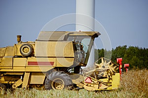 Combine harvesting the field