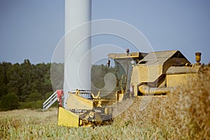 Combine harvesting the field