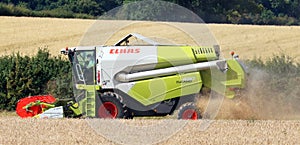 Combined Harvester in a wheat field.