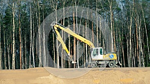 Combined road machinery - bulldozer and excavator