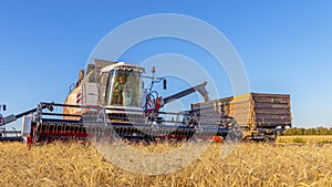 Combines and other equipment in the fields during the wheat harvest