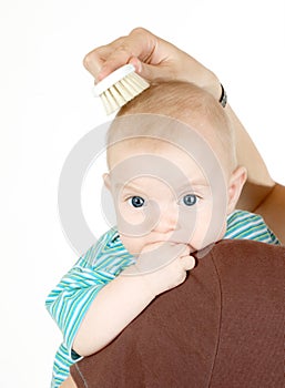 Combing baby`s hair