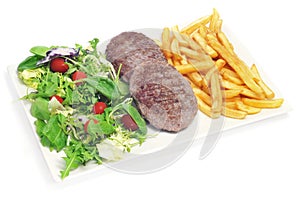 Combo platter with fried salad, burgers and french fries