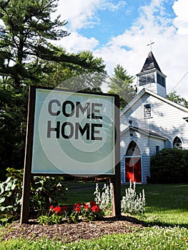 Come Home Christian Slogan on Sign