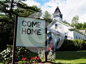 Come Home Christian Slogan on Sign