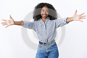 Come let me hug you. Portrait friendly-looking attractive female african american friend give warm welcome wanna embrace