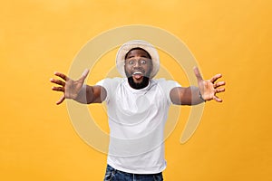 Come in my arms. Portrait of joyful friendly and happy handsome African American man with beard and short haircut