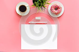 Come up with brand identity. Blank stationery for branding near coffee and donut on pink background top view mockup