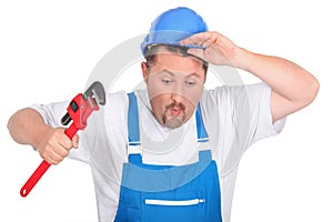 Plumber with a wrench