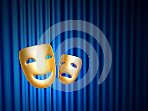 Comedy and tragedy masks over blue curtain