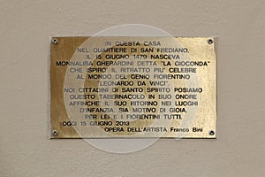 A comemmorative plaque on the family house of Monnalisa Gherardini, depicted in the famous Mona Lisa painting by Leonardo da Vinci photo